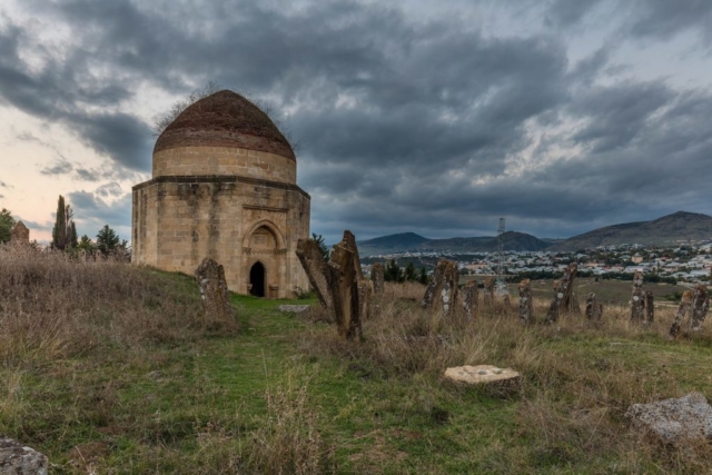 View of one of the Yeddi Gumbez Mausoleums at dusk in Şamaxı, Azerbaijan. The cemetery dates from 1810 and was built for a family of Mustafa khan – the last khan of Shamakhi.