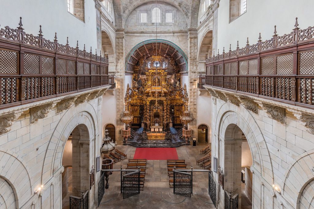 View of the main nave of the church of the monastery of San Martiño Pinario, Santiago de Compostela, Galicia, Spain. The temple, a work of Mateo López and González de Araújo, Bartolomé Fernández Lechuga and José de Peña y Toro, was finished in 1652. The jewel of the church is the elaborated reredos, the biggest designed by Fernando de Casas Novoa and of baroque style.