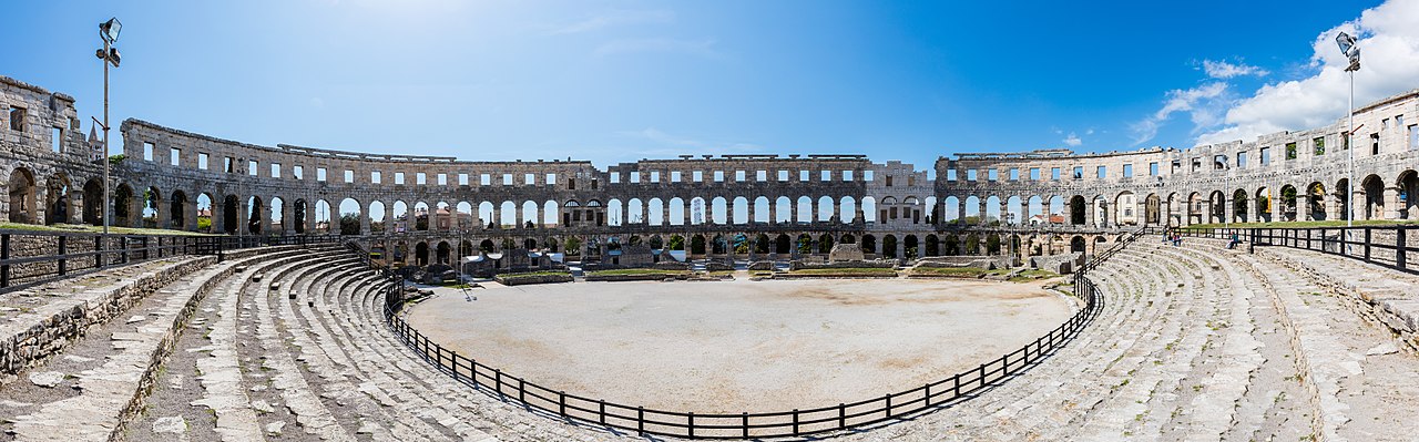 Panoramic view of the interior of the Pula Arena, an amphitheater located in Pula, Croatia.