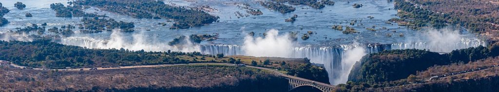 Aerial panoramic view of the Victoria Falls of the Zambezi River, border between Zambia and Zimbabwe.
