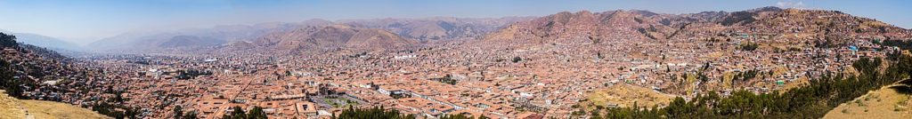 Panoramic view (span of approx. 150°) of the city of Cusco, Peru. The city, located near the Sacred Valley of the Andes mountain range, is the capital of the Cusco Province, has a population of 428,450 inhabitants and its elevation is around 3,400 metres (11,200 ft). The site was the historic capital of the Inca Empire from the 13th until the 16th-century Spanish conquest and was declared in 1983 a UNESCO World Heritage Site.