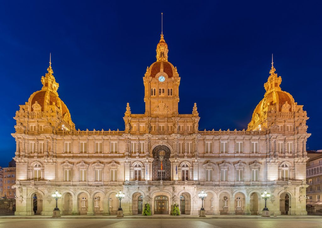 Front view of the city Hall of A Coruña, also called Municipal Palace, during the blue hour, Galicia, Spain.