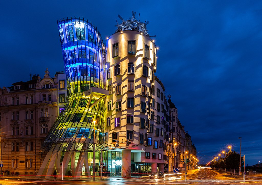 Dancing House by night illuminated with the colors of the Ukrainian flag to show solidarity with Ukraine, Prague, Czech Republic